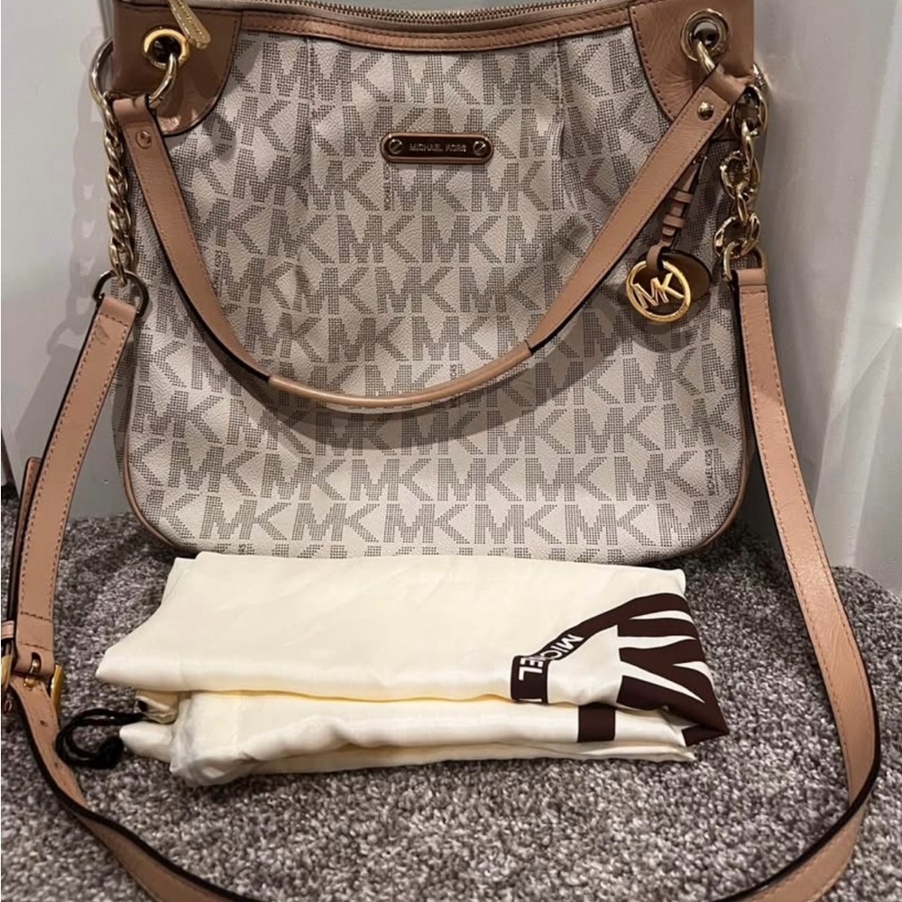 Michael Kors Beige and Brown Women’s Bag with dust ruffle included.